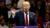 President-elect Donald Trump gestures as he speaks during a "USA Thank You" tour event in Cincinnati, Dec. 1, 2016.