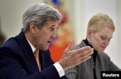 U.S. Secretary of State John Kerry makes a point during a meeting with Russian President Vladimir Putin at the Kremlin in Moscow, Russia, March 24, 2016.