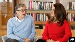 FILE - Microsoft co-founder Bill Gates and his wife Melinda are interviewed in Kirkland, Wash., Feb. 1, 2018.