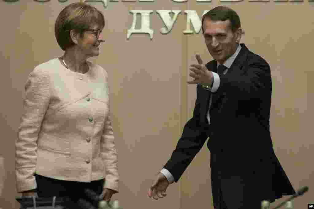 Russian State Duma speaker Sergei Naryshkin, right, welcomes PACE President Anne Brasseur prior to their meeting in Moscow, Russia, Thursday, Nov. 13, 2014.