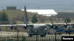 FILE- A U.S. Air Force C-130 transport plane is seen at a Turkish airbase. The U.S. military has been dropping supplies to rebels fighting Islamic State militants in northern Syria.