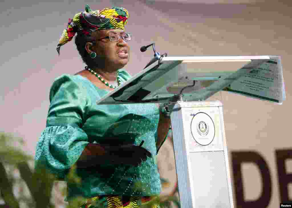 Nigeria's Finance Minister Ngozi Okonjo-Iweala address the audience on the achievements of President Goodluck Jonathan's administration while delivering the mid-term report during Democracy Day celebrations in Abuja May 29, 2013.