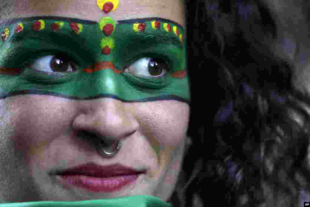 A woman attends a demonstration in support of decriminalizing abortion, outside the Argentine embassy in Quito, Ecuador.