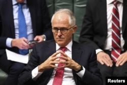 Then-Australian prime minister Malcolm Turnbull reacts during a debate at the House of Representatives, at Parliament House, in Canberra, Australia, Aug. 21, 2018. Turnbull was forced out Friday by party rivals.