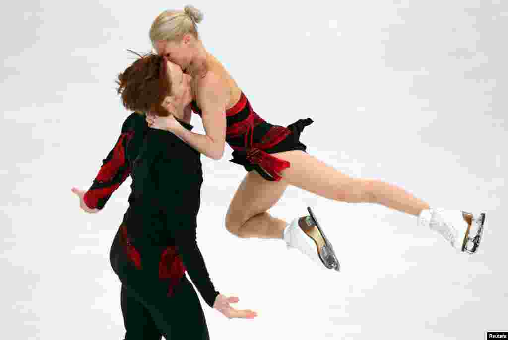 Evgenia Tarasova and Vladimir Morozov of Russia compete during the Olympic Qalifying ISU Challenger Series figure skating competition in Oberstdorf, Germany.