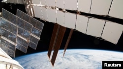 La Station spatiale internationale (ISS), en orbite autour de la Terre (NASA)