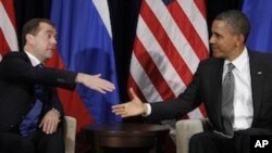 President Barack Obama meets with Russian President Dmitry Medvedev at the APEC Summit in Honolulu, Hawaii, Saturday, Nov. 12, 2011.