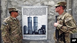 U.S. soldiers look at a Sept 11 memorial at the Jalalabad Air Field Base in eastern Afghanistan (File)