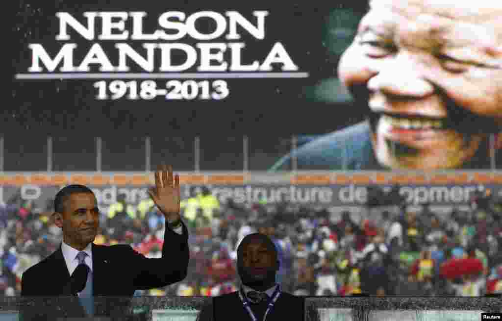 U.S. President Barack Obama addresses the crowd during a memorial service for Nelson Mandela at FNB Stadium in Johannesburg, South Africa, Dec. 10, 2013. 