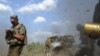 Порошенко: Украинская артиллерия уничтожила часть российской военной колонны