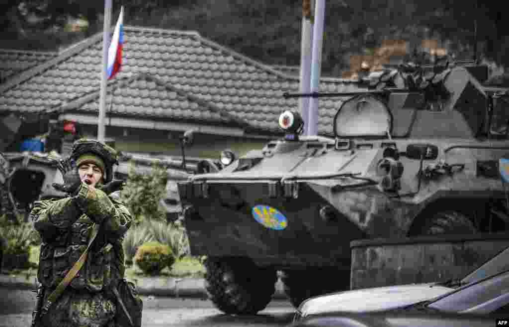 A Russian peacekeeper shouts &quot;No pictures!&quot; at a checkpoint outside the city of Stepanakert, during a cease-fire in the military conflict between Armenia and Azerbaijan over the breakaway region of Nagorno-Karabakh.