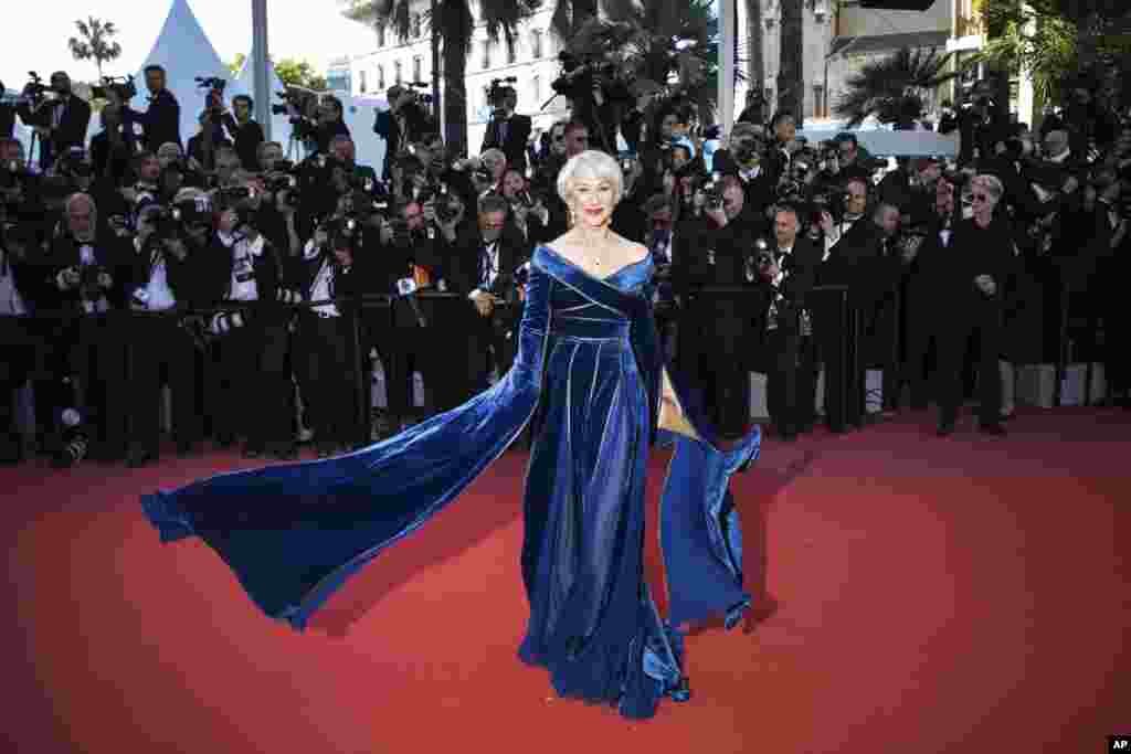 Actress Helen Mirren poses for photographers upon arrival at the premiere of the film 'Girls of The Sun' at the 71st international film festival, Cannes, southern France, May 12, 2018.