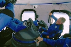 "Star Trek" actor William Shatner experiences weightlessness during the apogee of the Blue Origin New Shepard mission NS-18 suborbital flight near Van Horn, Texas, in a still image from video, October 13, 2021. (Blue Origin/Handout via Reuters)