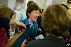 FILE - Republican Sen. Susan Collins speaks to reporters on Capitol Hill in Washington, June 23, 2016. Collins wrote in The Washington Post that she cannot support Republican presidential candidate Donald Trump in the fall election.