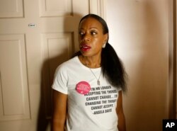 FILE - Designer Tracy Reese prepares for the presentation of her collection during Fashion Week in New York, Feb. 12, 2017.