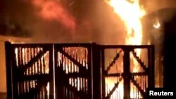 A fire rages at the London Zoo, Dec. 23, 2017, in this image taken from video footage obtained from social media.