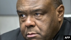 FILE - Former DRCongo leader Jean-Pierre Bemba Gombo waits in a court room of the ICC in The Hague, March 21, 2016. 