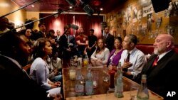 President Barack Obama meets with people who were formerly incarcerated and have previously received commutations, March 30, 2016, at Busboys and Poets restaurant in northwest Washington.