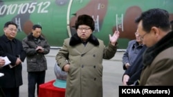 North Korean leader Kim Jong Un meets with scientists and technicians involved in the country's weapons program in this undated photo released by North Korea's Korean Central News Agency. Some in the West have asked if it is time to revisit the current strategy of relying only on sanctions to change Pyongyang’s behavior.