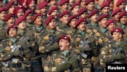 FILE - Indian Special Forces commando G. D. Singh shouts as he leads his battalion during the Republic Day parade in New Delhi.