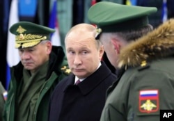 Russian President Vladimir Putin speaks while visiting the Military Academy of Strategic Rocket Troops after Peter the Great in Balashikha, outside Moscow, Dec. 22, 2017.