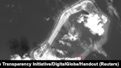 2017年2月22日公布的一张卫星图像显示如美国智库“战略与国际研究中心”(CSIS)的“亚洲海事透明倡议” (Asia Maritime Transparency Initiative)指出，在南中国海的人造岛永暑礁上看来有伸缩屋顶的水泥建筑物。