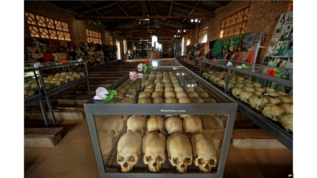Skulls of some of those who were slaughtered as they sought refuge in the church sit in glass cases, kept as a memorial to the thousands who were killed in the 1994 genocide in Rwanda.