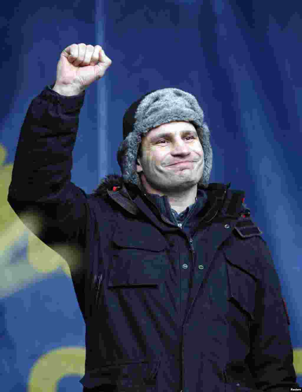 Opposition leader Vitaly Klitschko gestures to the crowd during a pro-European rally in Independence Square, Kyiv, Ukraine, Jan. 19, 2014.
