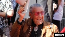 Actor Herb Jeffries, who appeared as a singing cowboy in films, arrives at the opening night gala of the 2011 TCM Classic Film Festival featuring a screening of a restoration of 'An American In Paris' in Hollywood, California, April 28, 2011.