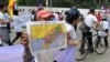 FILE PHOTO - A man shows the map of Kampuchea Krom during a demonstration in front of the Vietnamese Embassy, Phnom Penh, Cambodia, Monday, July 21, 2014. (Suy Heimkhemra/VOA Khmer