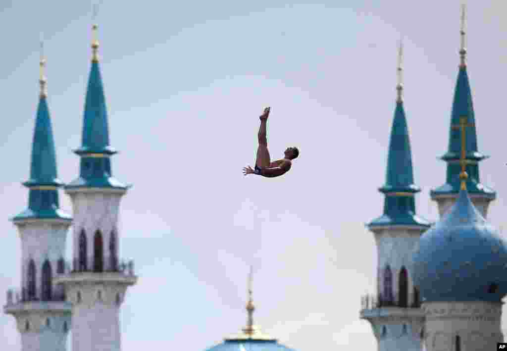 Michal Navratil of the Czech Republic competes during the men's 27-meter high dive final at the Swimming World Championships in Kazan, Russia.