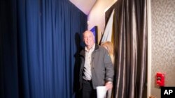 Republican Greg Gianforte prepares to go onstage at a hotel ballroom to thank supporters after winning Montana's sole congressional seat, May 25, 2017.
