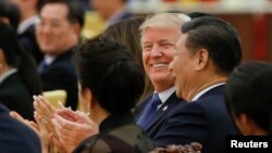 U.S. President Donald Trump and China's President Xi Jinping attend a state dinner at the Great Hall of the People in Beijing, Nov. 9, 2017.