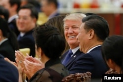 U.S. President Donald Trump and China's President Xi Jinping attend a state dinner at the Great Hall of the People in Beijing, Nov. 9, 2017.