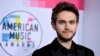 FILE - Zedd arrives at the American Music Awards at the Microsoft Theater.