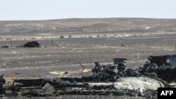 Debris of the A321 Russian airliner lie on the ground a day after the plane crashed in Wadi al-Zolomat, a mountainous area in Egypt's Sinai Peninsula, Nov. 1, 2015. 