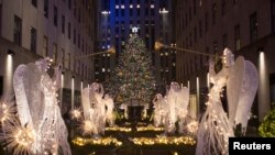 The Christmas tree stands lit after the lighting ceremony for the 84th annual Rockefeller Center Christmas Tree at Rockefeller Center in Manhattan, New York City, U.S., Nov. 30, 2016. 