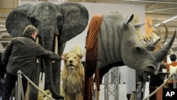 FILE - Big-game trophies abound at an international hunting fair.
