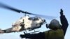 Des hélicoptères américains de combats entre en action à Syrte, en Libye