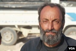 Abd Hassan Shaban, a 50-year-old father of seven, a week after fleeing his home in Raqqa, is seen in Ain Issa camp, Syria, Oct. 23, 2017.(VOA/H. Murdock)