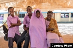FILE - Several students at Illeys Elementary School in Kenya's Dadaab refugee camp pose for a photo. Asad Hussein (not shown), a 22-year-old raised in the camp, has been accepted at Princeton University in the United States. (Photo courtesy of CARE)