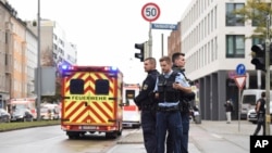 Police guard the area at Rosenheimer Platz square in Munich, Germany, Saturday, Oct. 21, 2017. 