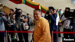 FILE - Win Htein, one of the leaders of National League for Democracy party, arrives to attend a conference in Naypyitaw, Myanmar, May 24, 2017.