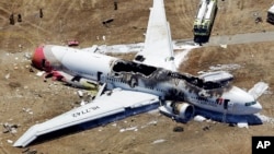 The wreckage of Asiana flight 214 at San Francisco International Airport. 