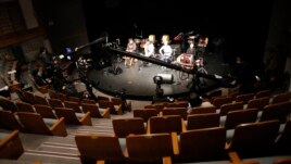 Camera crews prepare for online live during a rehearsal of a Korean traditional music concert at Korea Donhwamun Traditional Theater in Seoul, South Korea, Thursday, March 19, 2020.