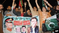 Pakistani protesters shout anti-Indian slogans in Hyderabad, Pakistan, Feb. 26, 2019.