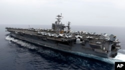 FILE - The USS Harry S. Truman, a nuclear-powered aircraft carrier, has recently been moved into the Mediterranean Sea but soon will head back to the United States.