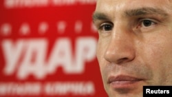 Heavyweight boxing champion and UDAR (Punch) party leader Vitaly Klitschko attends a news conference at his party's election headquarters in Kiev, October 29, 2012. 