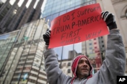 A supporter of President Donald Trump chants slogans during a March 4 Trump rally on Fifth Avenue near Trump Tower in New York, , March 4, 2017.