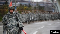 South Korean marines march during a military exercise as a part of the annual joint military training called Foal Eagle between South Korea and the U.S. in Pohang, South Korea, April 5, 2018. 